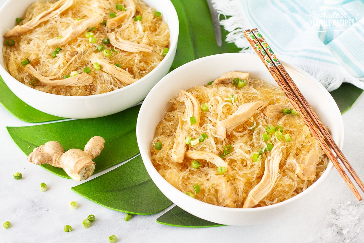 Two large bowls of Hawaiian Style Chicken Long Rice Noodles with chopsticks.