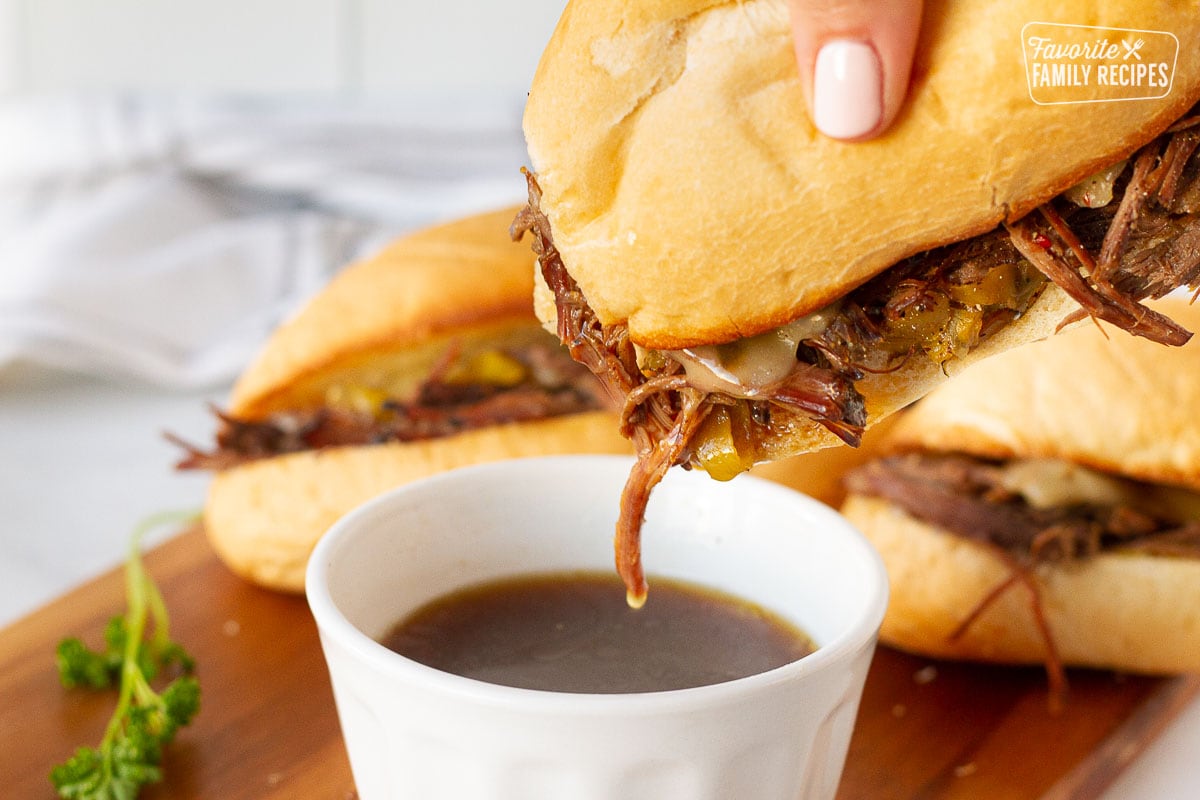 Dipping an Italian Beef Sandwich in au jus.