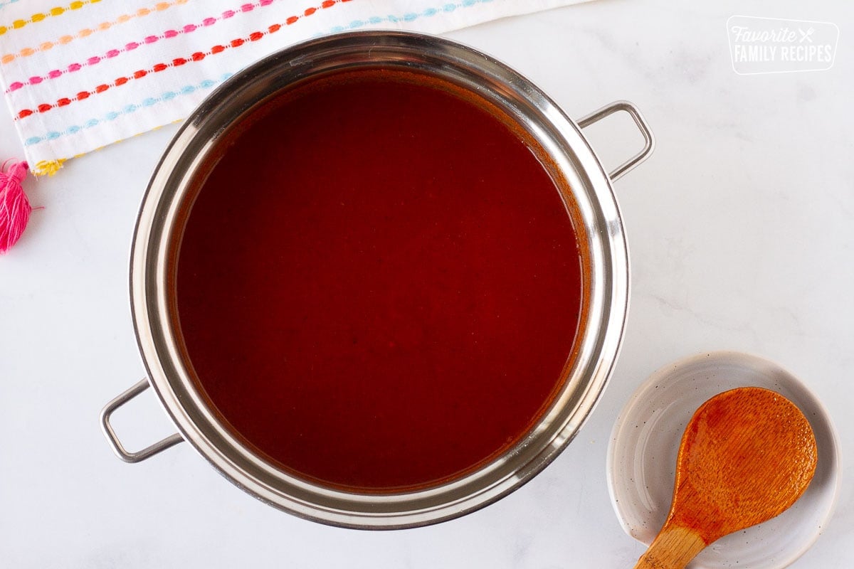 Pan of homemade enchilada sauce for Easy Cheese Enchiladas.