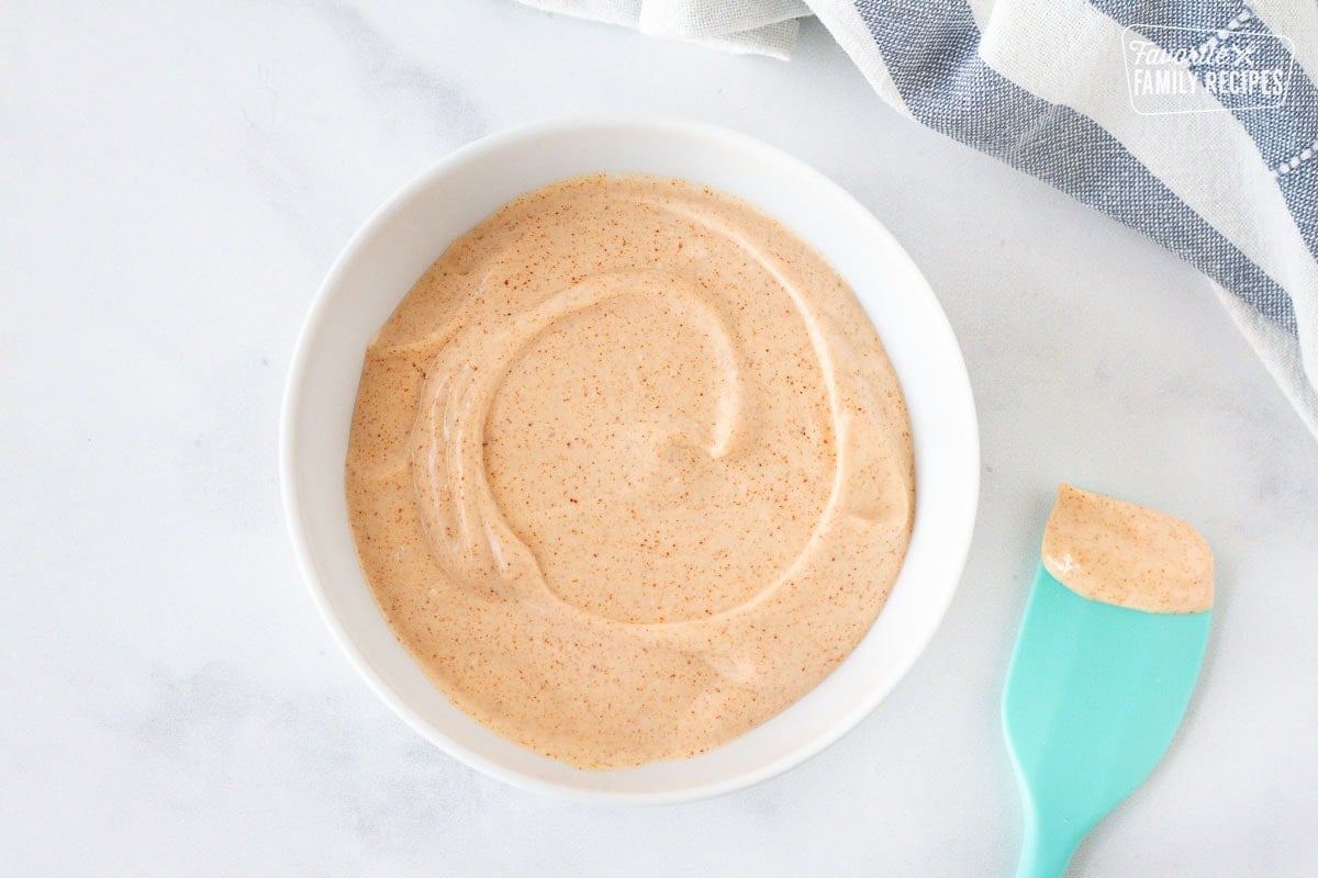 Mixing bowl of sauce of Spicy Aioli Sauce for Grilled Chicken Sandwiches.