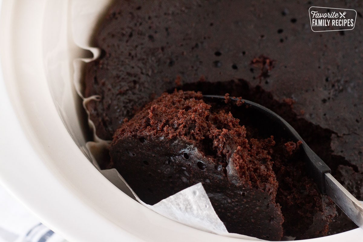 Spoon scooping a serving of Crockpot Lava Cake.