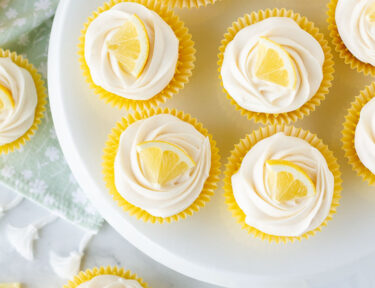 Lemon Cupcakes on a cake stand.