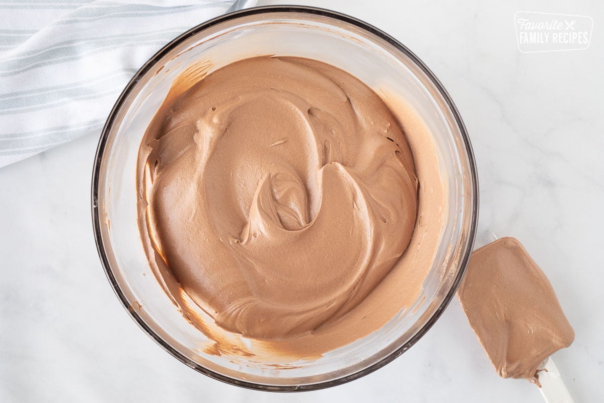 Mixing bowl with chocolate mousse layer for Costco Peanut Butter Chocolate Cream Pie.