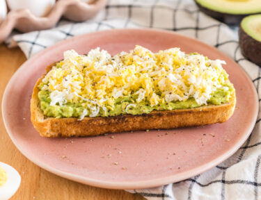 avocado toast with a grated hard boiled egg on top