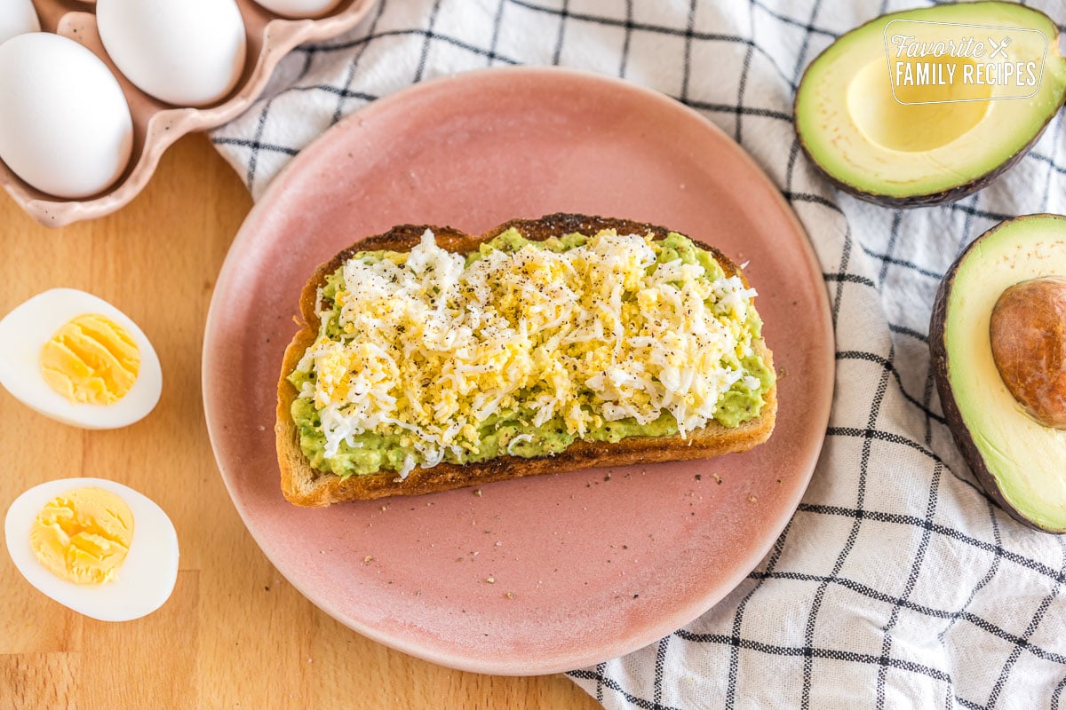 avocado toast with a grated hard boiled egg on top