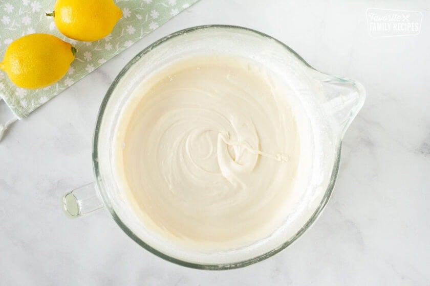 Mixing bowl with Lemon cream cheese frosting for the cupcakes.