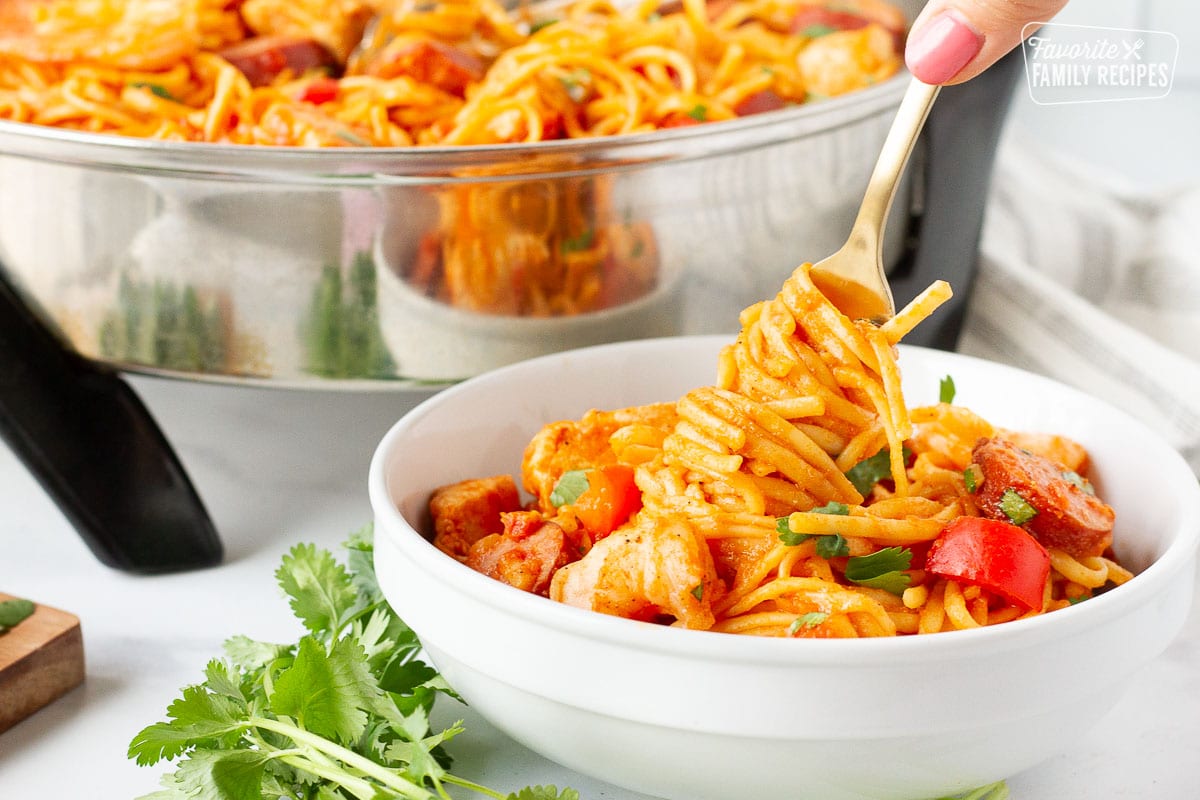 Fork twirling Jambalaya Pasta noodles.