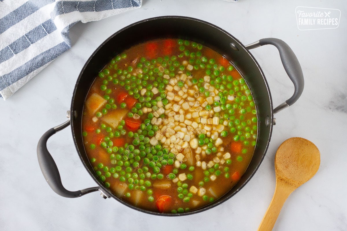 Peas and corn added to the pot of Hearty Beef Stew.