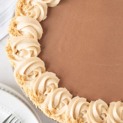 Costco Peanut Butter Chocolate Cream Pie decorated with graham cracker crumbles.