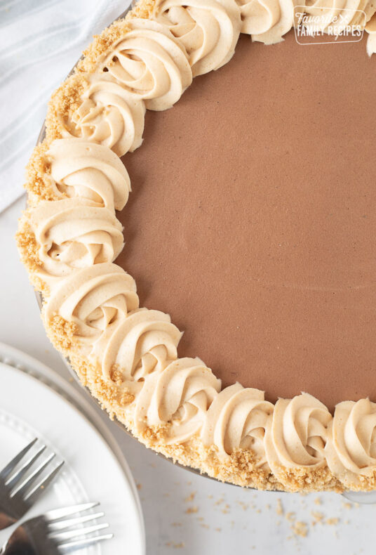 Costco Peanut Butter Chocolate Cream Pie decorated with graham cracker crumbles.