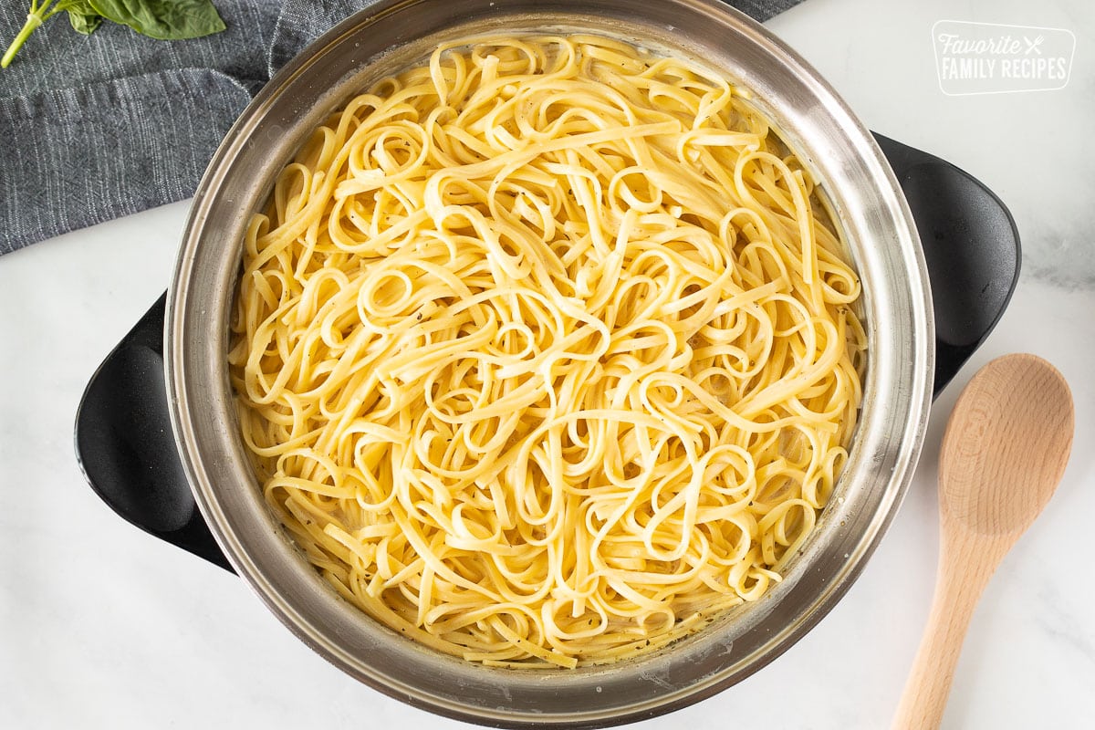 Pot with cooked linguine noodles for One Pot Creamy Garlic Noodles.