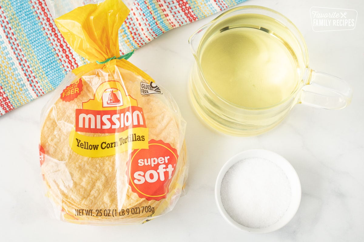 Ingredients to make Tortilla Strips including yellow corn tortillas, oil and salt.