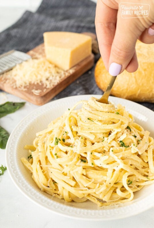 Fork spinning Creamy Garlic Noodles.