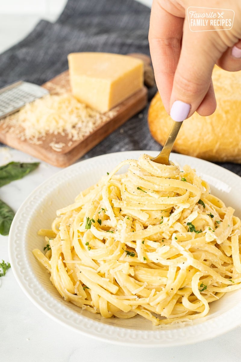 Fork spinning Creamy Garlic Noodles.