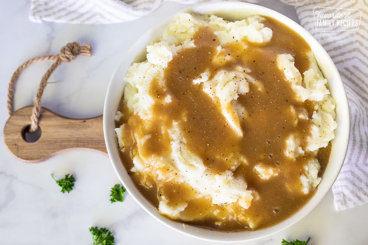 Large Bowl of mashed potatoes with Beef Gravy.
