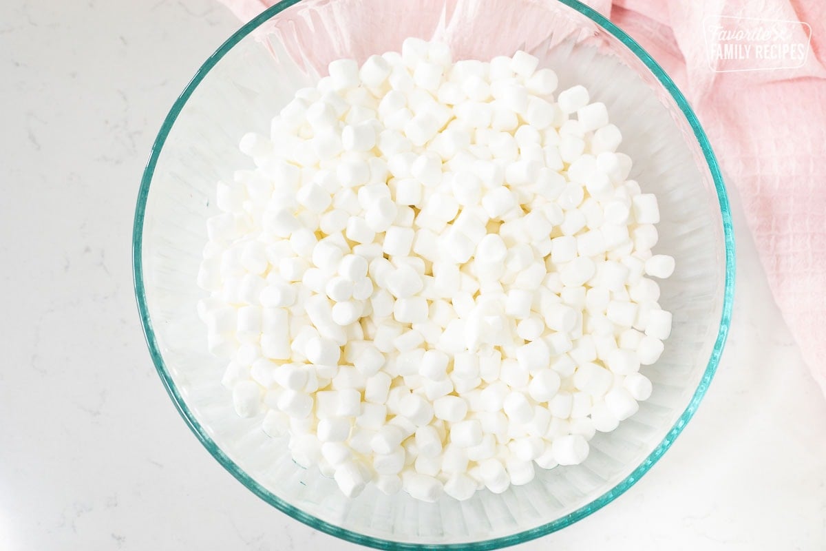 Bowl of mini marshmallows, crisco and water to show How to Make Fondant.