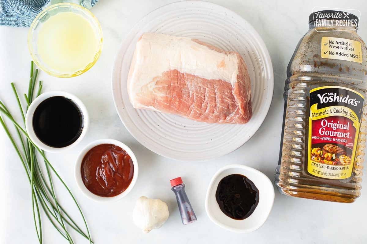 Ingredients to make Char Siu including Mr. Yoshida's marinade, pork tenderloin, broth, soy sauce, hoisin sauce, ketchup, garlic and red food coloring.