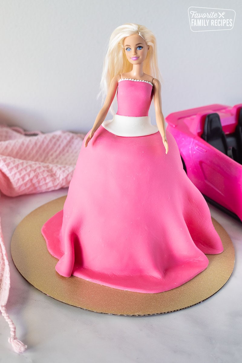 Decorated Barbie Cake with hot pink fondant.