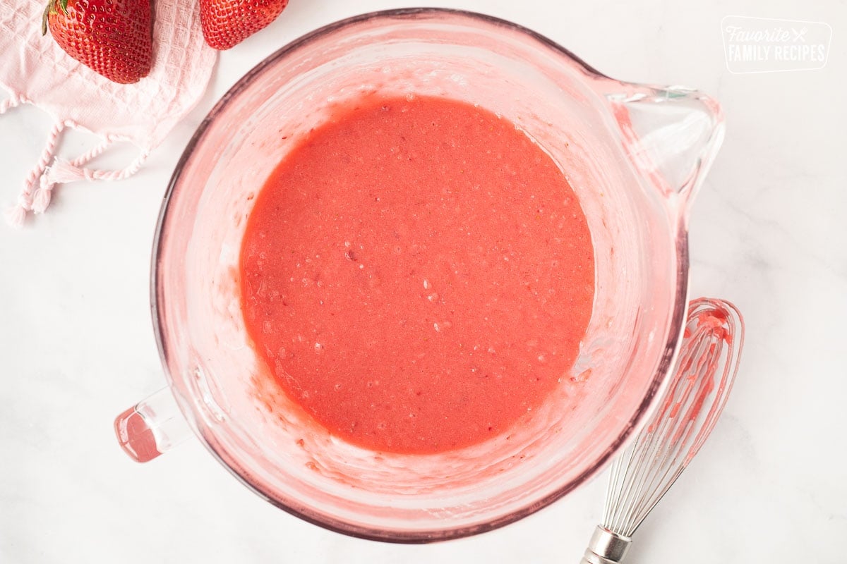 Mixing bowl with cake batter for Fresh Strawberry Cake.