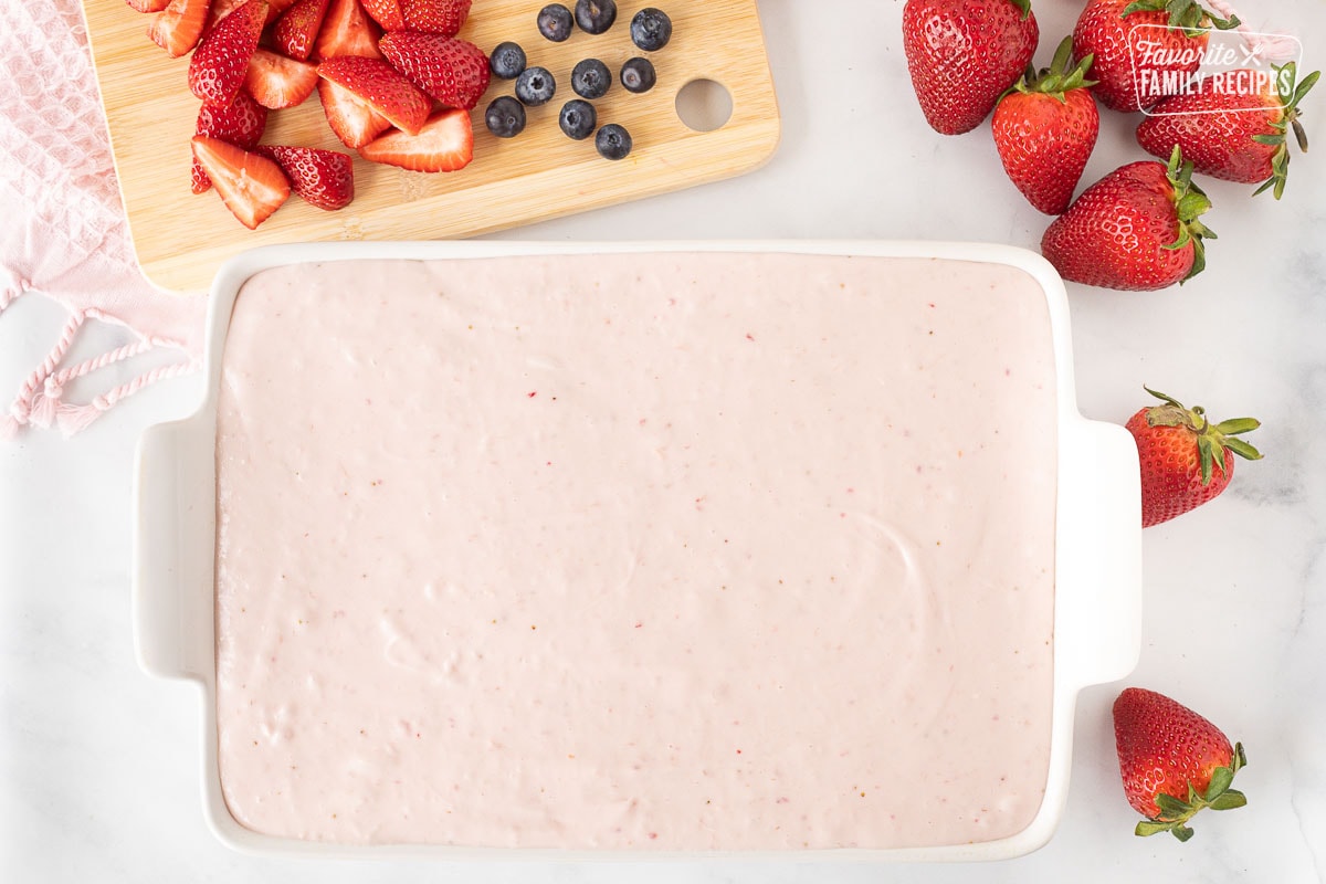 Frosted Fresh Strawberry Cake in a baking dish.