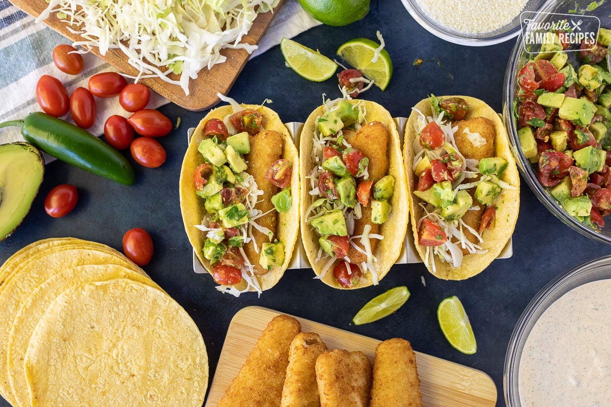 Three Easy Fish tacos assembled with fish fillets, cabbage and pico de Gallo.