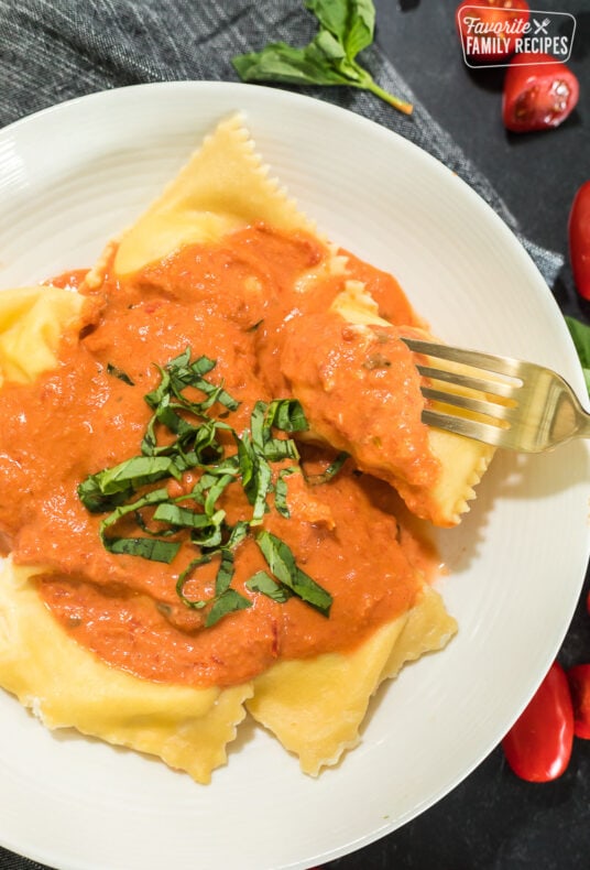 Ravioli with a creamy tomato sauce over the top
