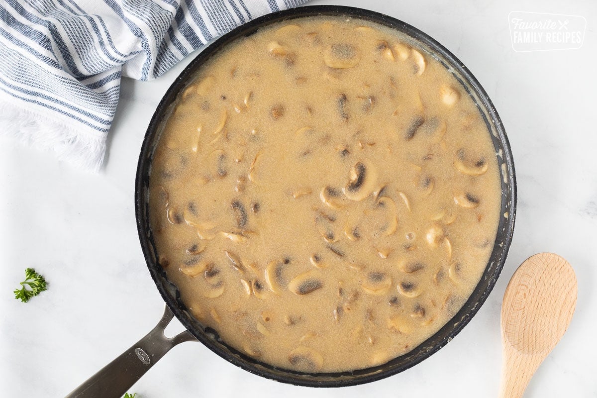 Sauce for Chicken Marsala in a skillet.