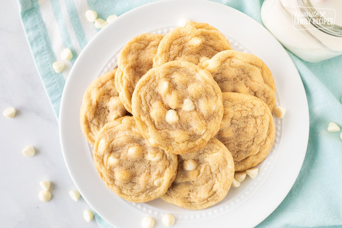 Top view of Vanilla Cookies on a plate with a glass of milk.