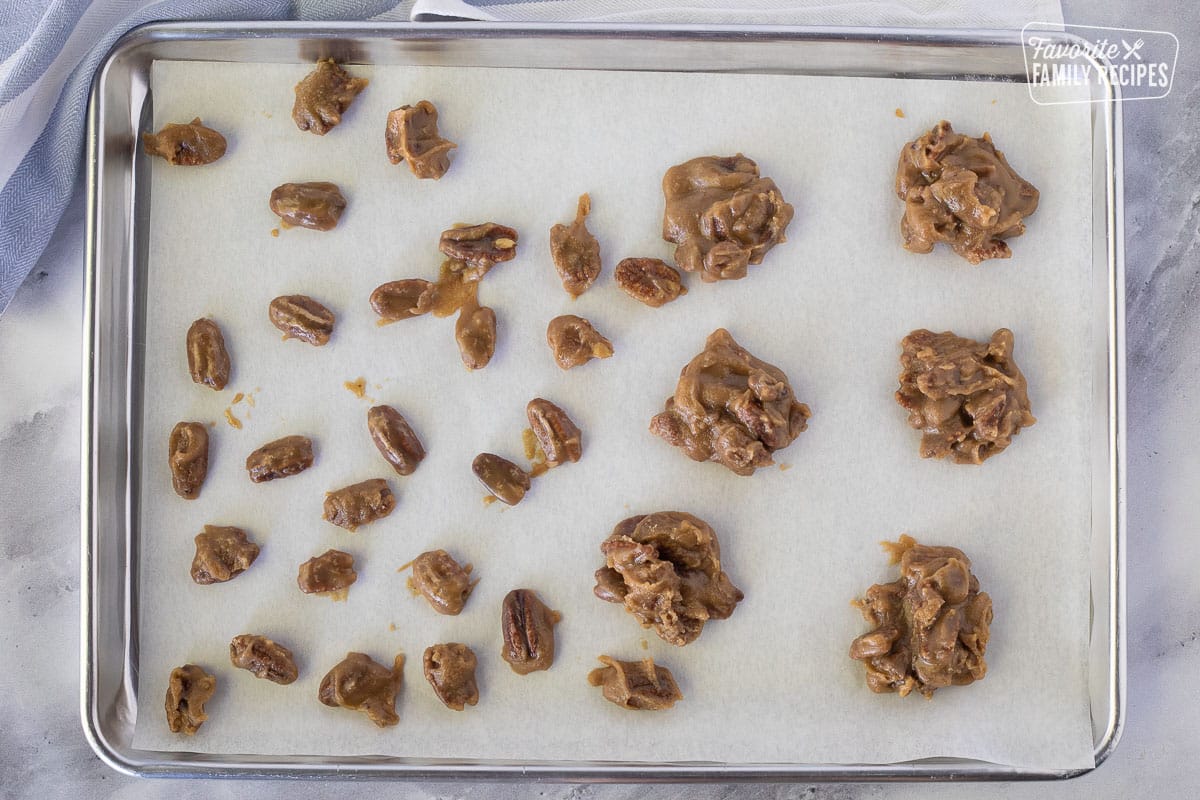 Cookie sheet of Pecan Pralines as individual and patties.