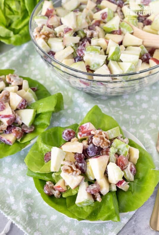 Waldorf Salad on a plate of lettuce greens.