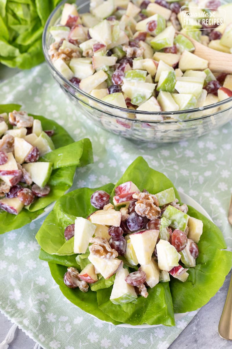 Waldorf Salad on a plate of lettuce greens.