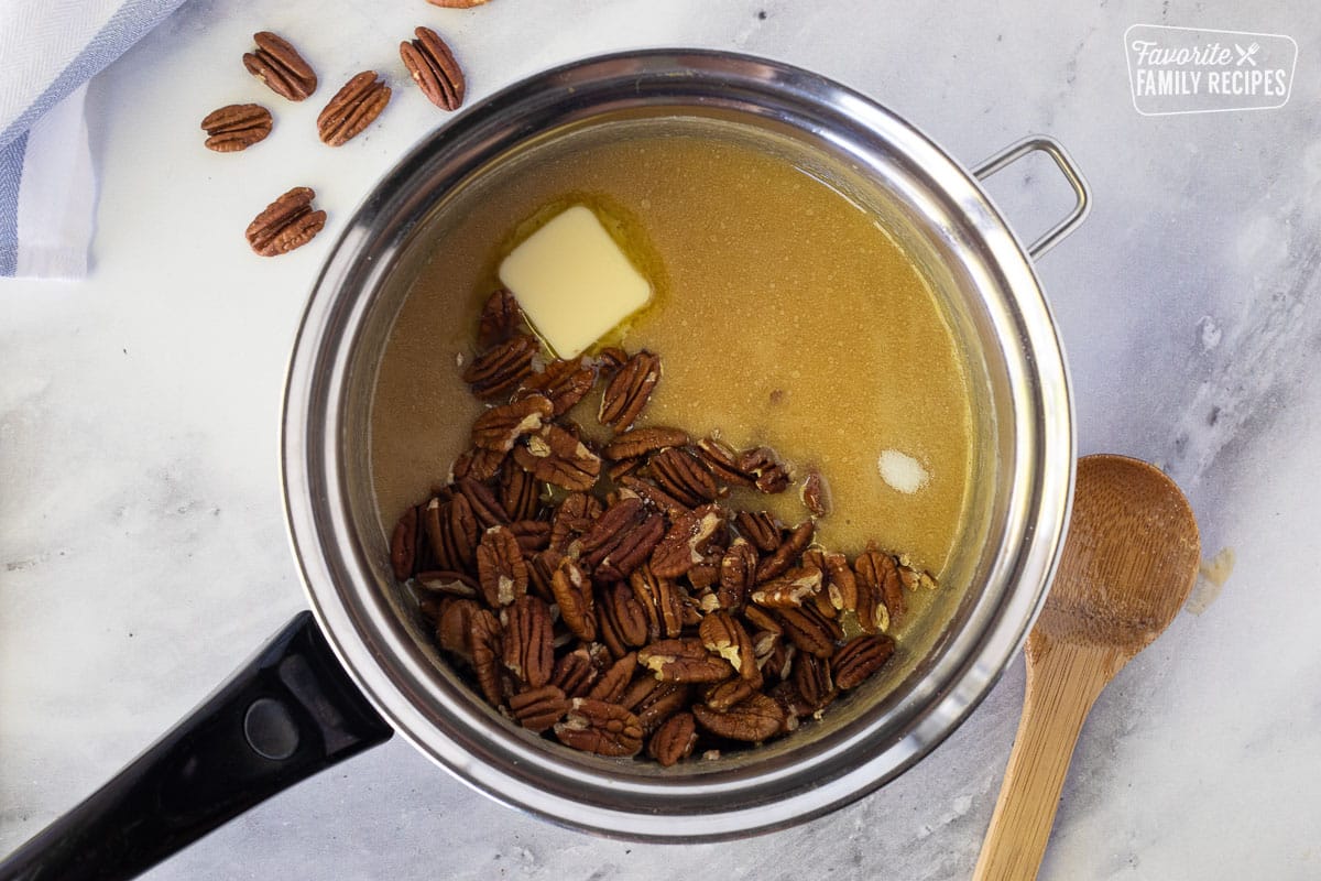 Pan with added pecans, butter and salt for Pecan Pralines.