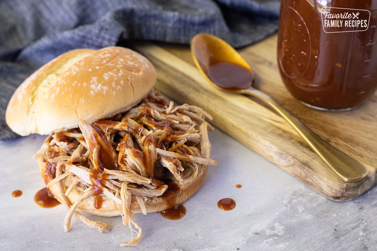 Pulled Pork sandwich topped with Homemade BBQ Sauce.