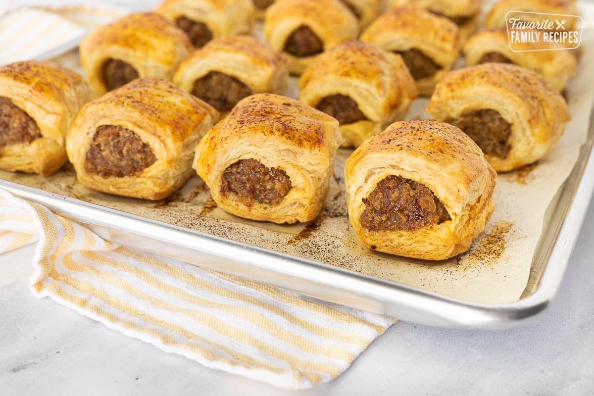 Cooling Sausage Rolls on a baking sheet.