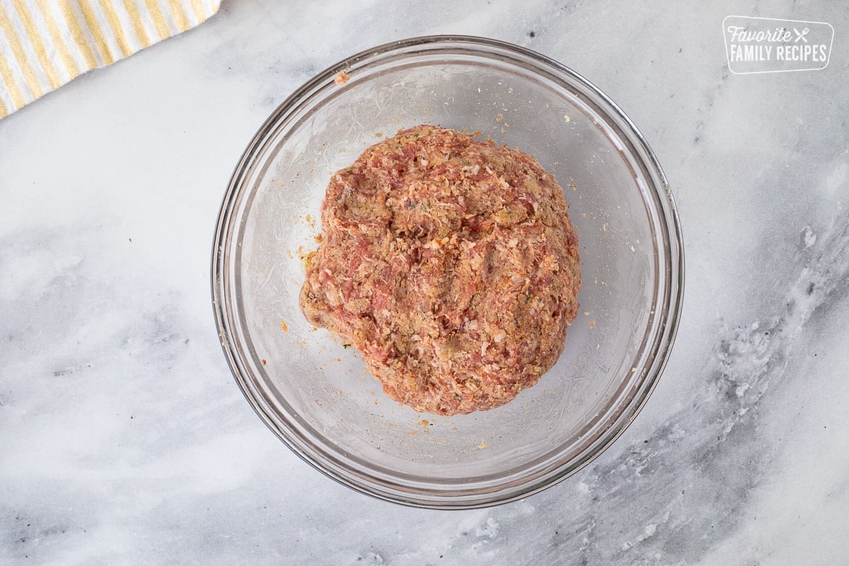 Glass bowl with Sausage mixture for Roll filling.