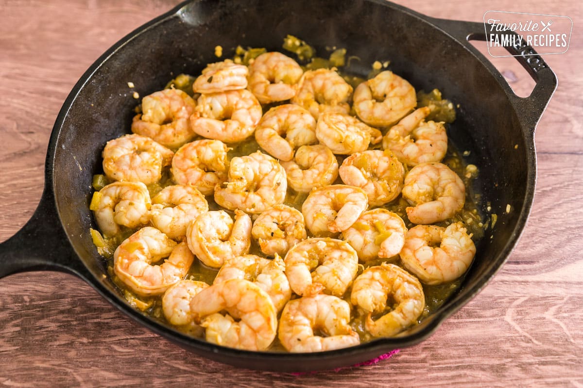 cooked shrimp in a cast iron pan