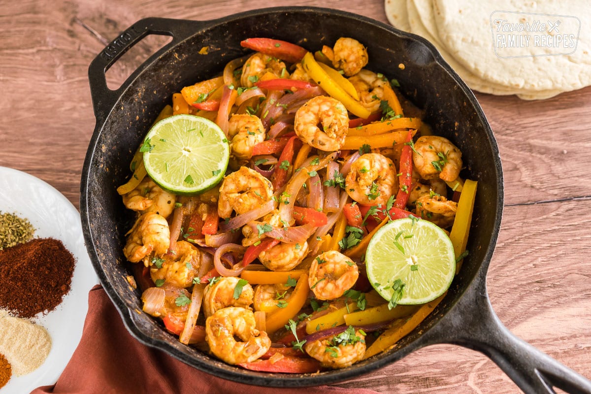 shrimp fajitas filing in a cast iron skillet