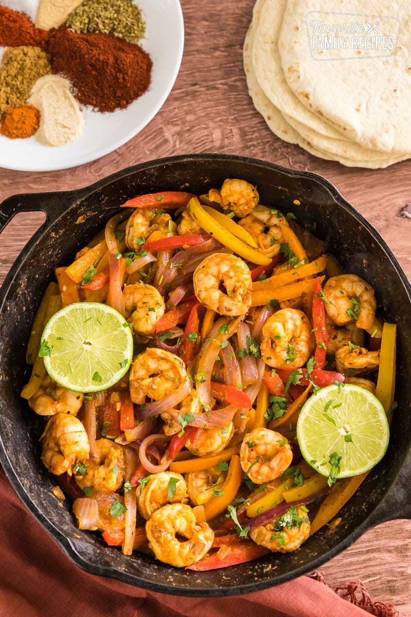 shrimp fajitas filing in a cast iron skillet