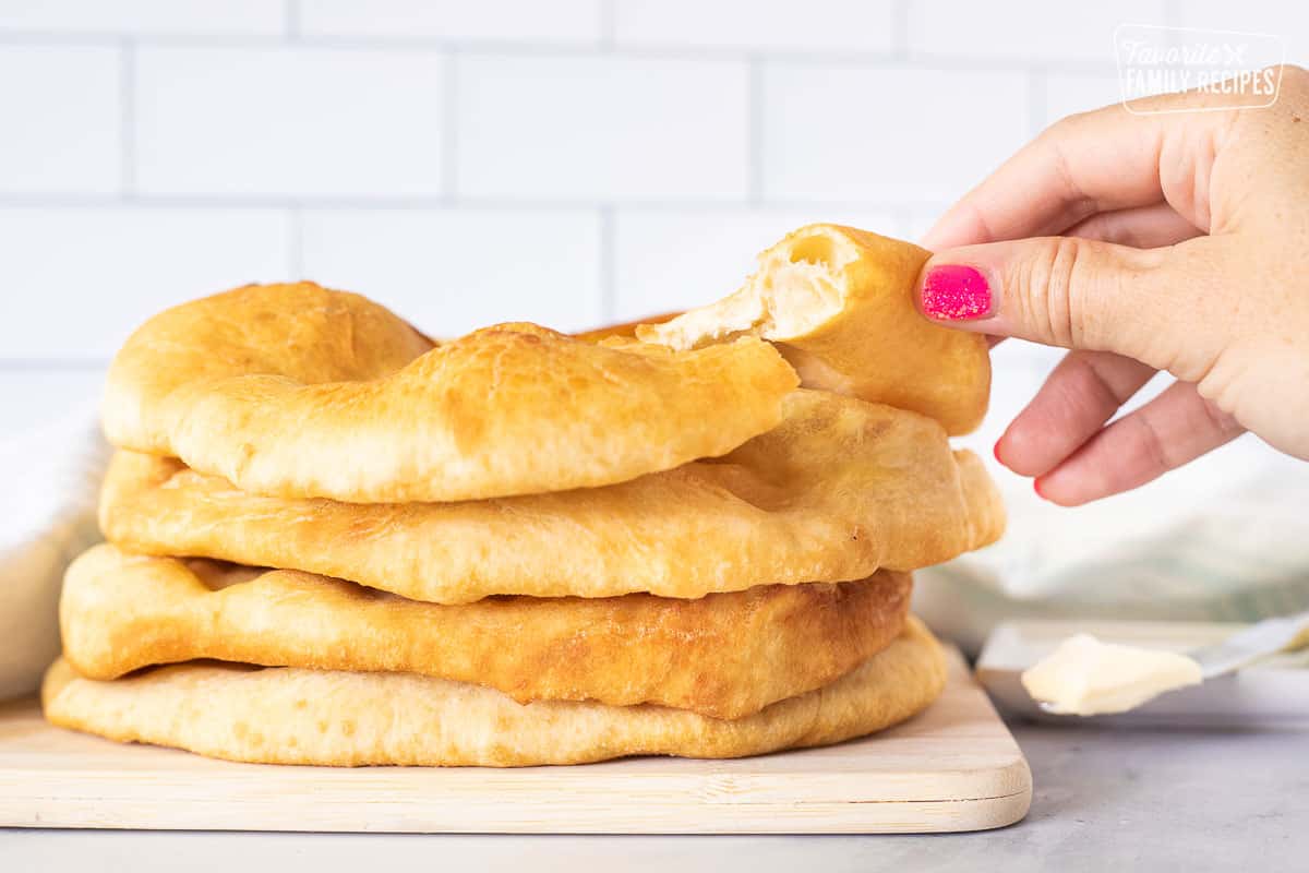 Tearing a piece of Fry Bread.