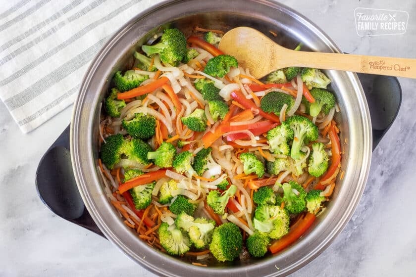 Skillet with cooked vegetables for Beef Stir Fry.