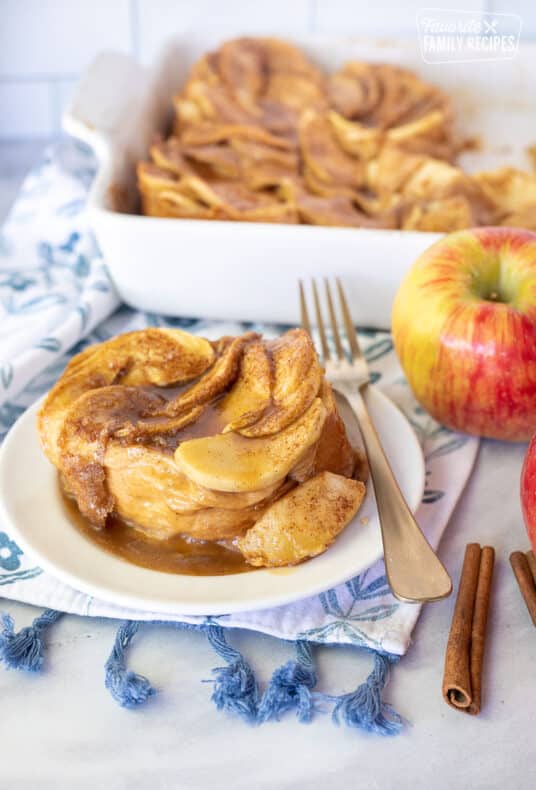 Plate of Caramel Apple French Toast Casserole with a fork.
