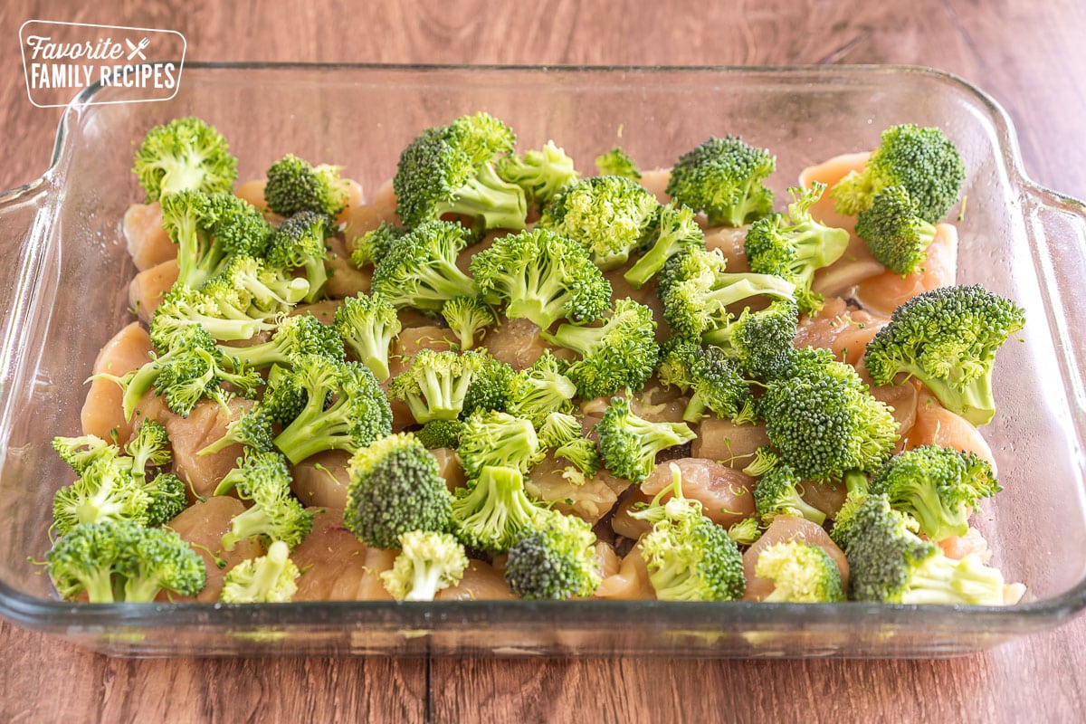 white meat and broccoli in a baking pan