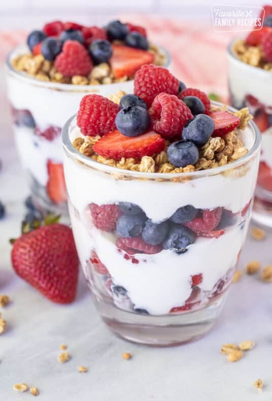 Breakfast Parfait topped with strawberries, blueberries and raspberries.