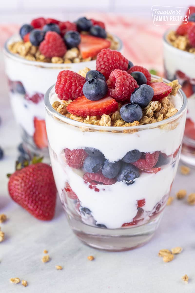 Breakfast Parfait topped with strawberries, blueberries and raspberries.