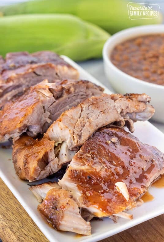 Crock Pot Ribs cut in small sections on a platter.