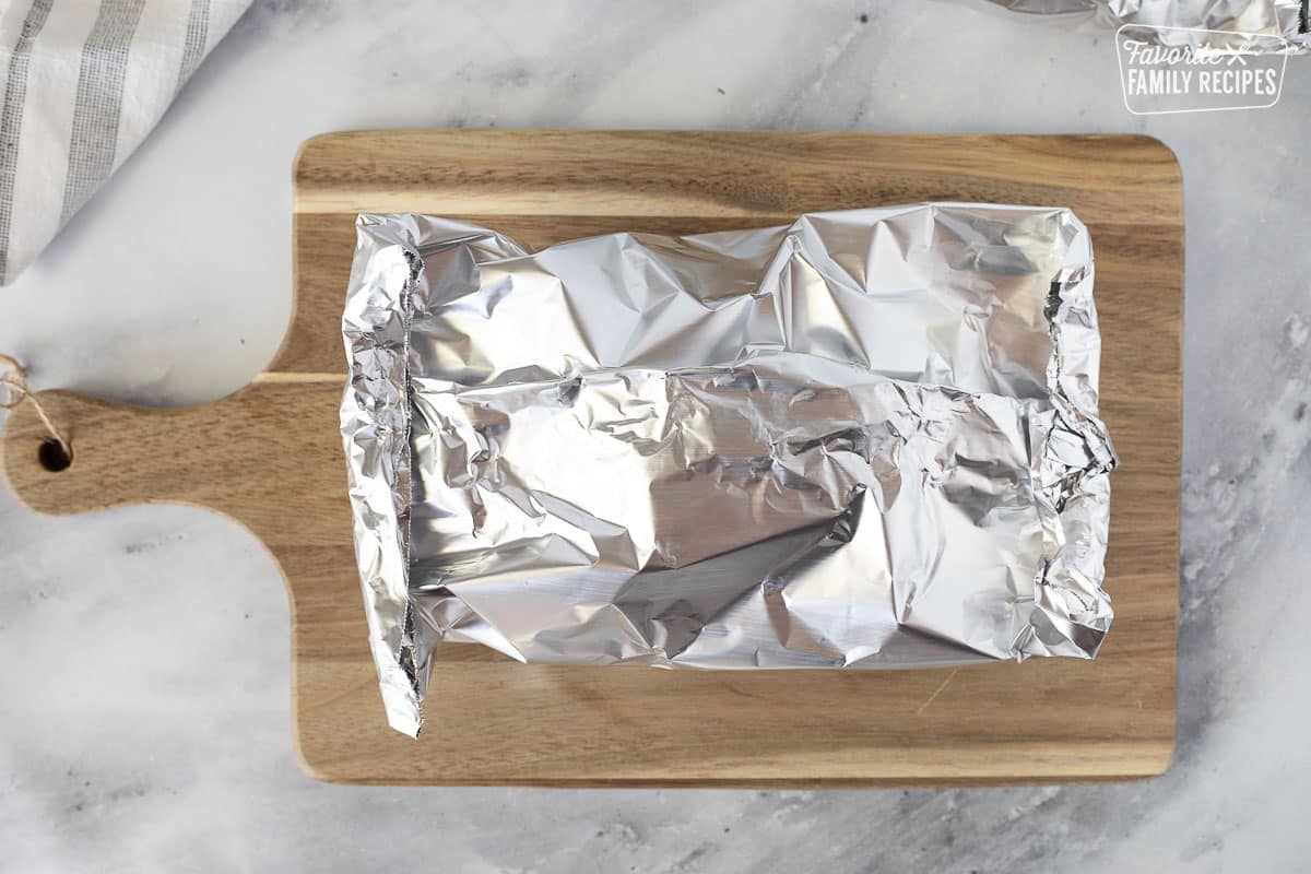 Folded foil packet for grilling Ranch Potatoes.