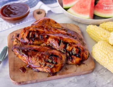 Honey BBQ Chicken on a cutting board.