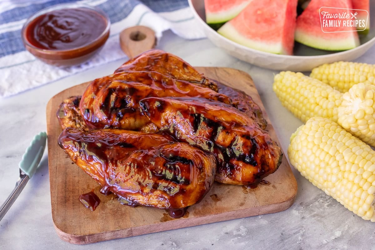 Honey BBQ Chicken on a cutting board.