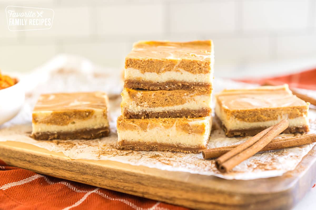 A stack of pumpkin cheesecake bars