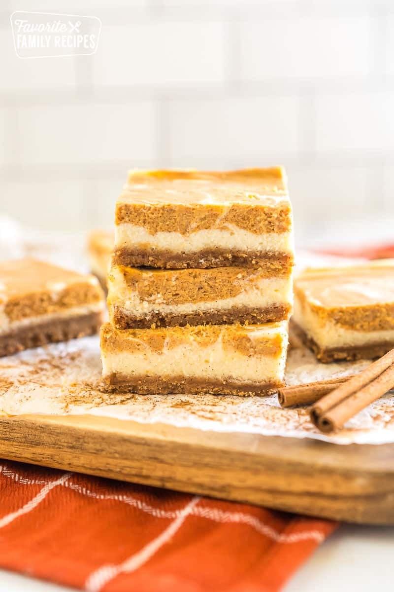 A stack of pumpkin cheesecake bars